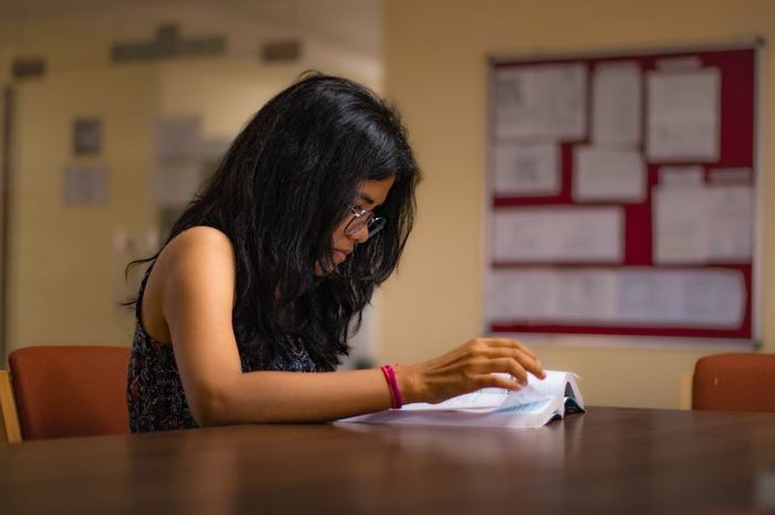 A student studying at a desk
